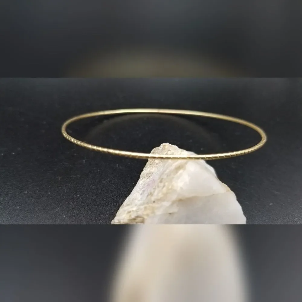 Archaic gold tone slim bracelet slider. B714